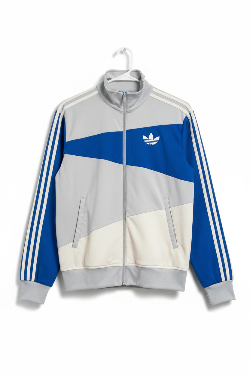 Beige jacket with Adidas logo on a dark background